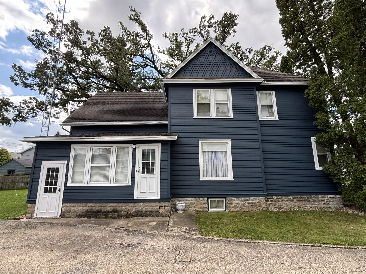 Two-story, mauve to navy, after