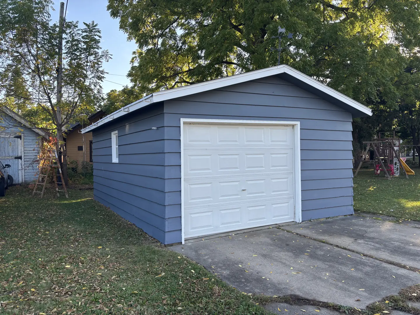 Detached garage, siding and trim, after