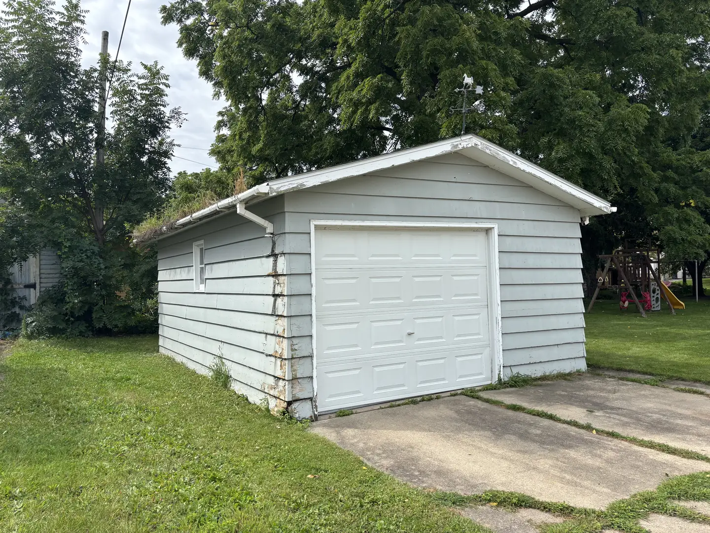 Detached garage, siding and trim, before