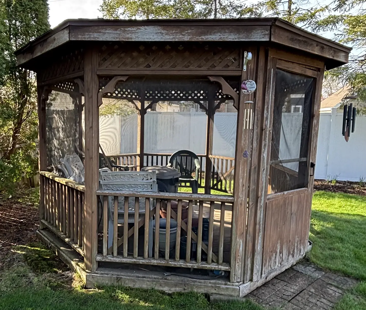 Backyard gazebo, stripped and re-stained, before